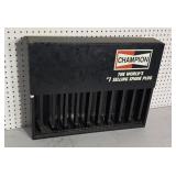 Old metal champion wall mount spark plug display