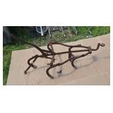 Old horse drawn cultivator.