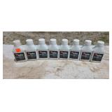 Eight bottles of two-cycle oil