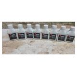 Eight bottles of 2-stroke oil
