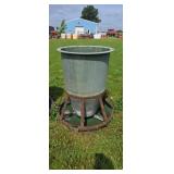36-in tall round fiberglass sow feeder.
