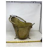 Brass coal scuttle with porcelain handle