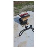 Spool of new chainsaw chain