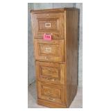 Wood 4 drawer filing cabinet. Two locking drawers