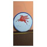 Mobilgas Metal Sign Featuring the Iconic Red