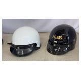 Black and a white Shorty motorcycle helmet  with