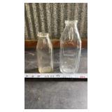 Vtg Clear glass milk bottles feature a classic,
