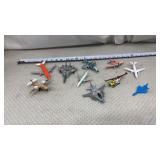 Die-cast and plastic toy aircraft includes