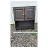 Vtg dark stained wooden wall cabinet features two