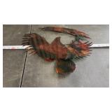 Landing Hawk metal wall art features a