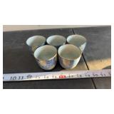 Japanese floral ceramic teacups featuring a blue