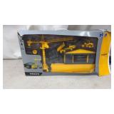 New Ray Volvo playset features a yellow