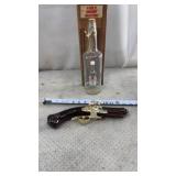 Avon glass decanter shaped like a blunderbuss or