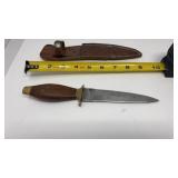 Vtg fixed-blade boot knife featuring a wood