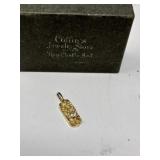 Gold tone nugget charm pendant