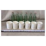 Coca Cola Bottles and Coffee Mugs