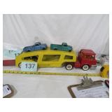 1960 STRUCTO HAULER W/TWO TRUCKS & METAL RAMP