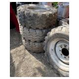 Four 10-16.5 LT Tires and 8 Lug Rims , Couple