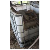 Chemical Tote Full of Hedge Firewood