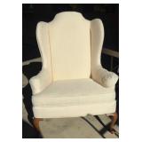 Vtg cream-colored wingback armchair