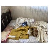 Curtains, Pillows and Pillow Cases On Bed
