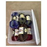 Tote with Lid Full of Different Colored Yarn
