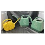 Three Watering Plastic Cans
