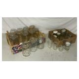 Various Sizes of Jars Some with Lids