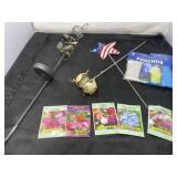 Two New Ponchos, Flower Seeds and Garden Stake