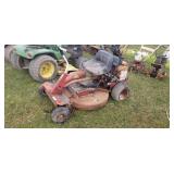 Older snapper ridding lawn mower.
