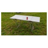 Folding aluminum table.