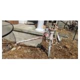 Old well pump with lead pipe.