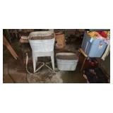 Two galvanize wash tubs one one stand.