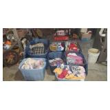 7 totes with Lids full of clothes & material.
