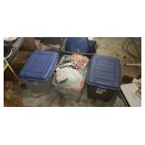 4 plastic totes one full of material