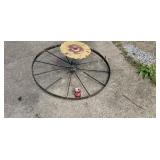 Steel wheel lawn art