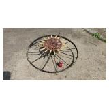 Steel wheel lawn art