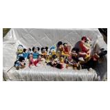 Mickey Mouse and Minnie mouse collectible dolls.