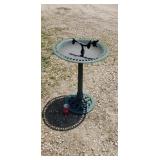 Bird bath cracked in bowl.