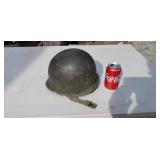 World War II fixed bails helmet with liner.
