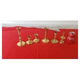 Baldwin brass candel holders one is not.