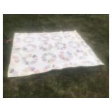 Homemade quilt some stains