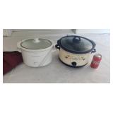 Two crock pots.