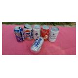 Collectors pop cans.