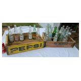 2 wood pop crates with old pop bottles