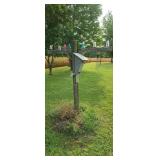 Yard art glass insulators & bird house.