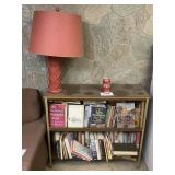 BOOKCASE FULL OF BOOKS, LAMP