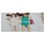 2 cabbage patch dolls.