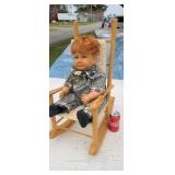 1993  Secrist Mylo doll in rocking chair.