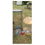 Two bird cages.